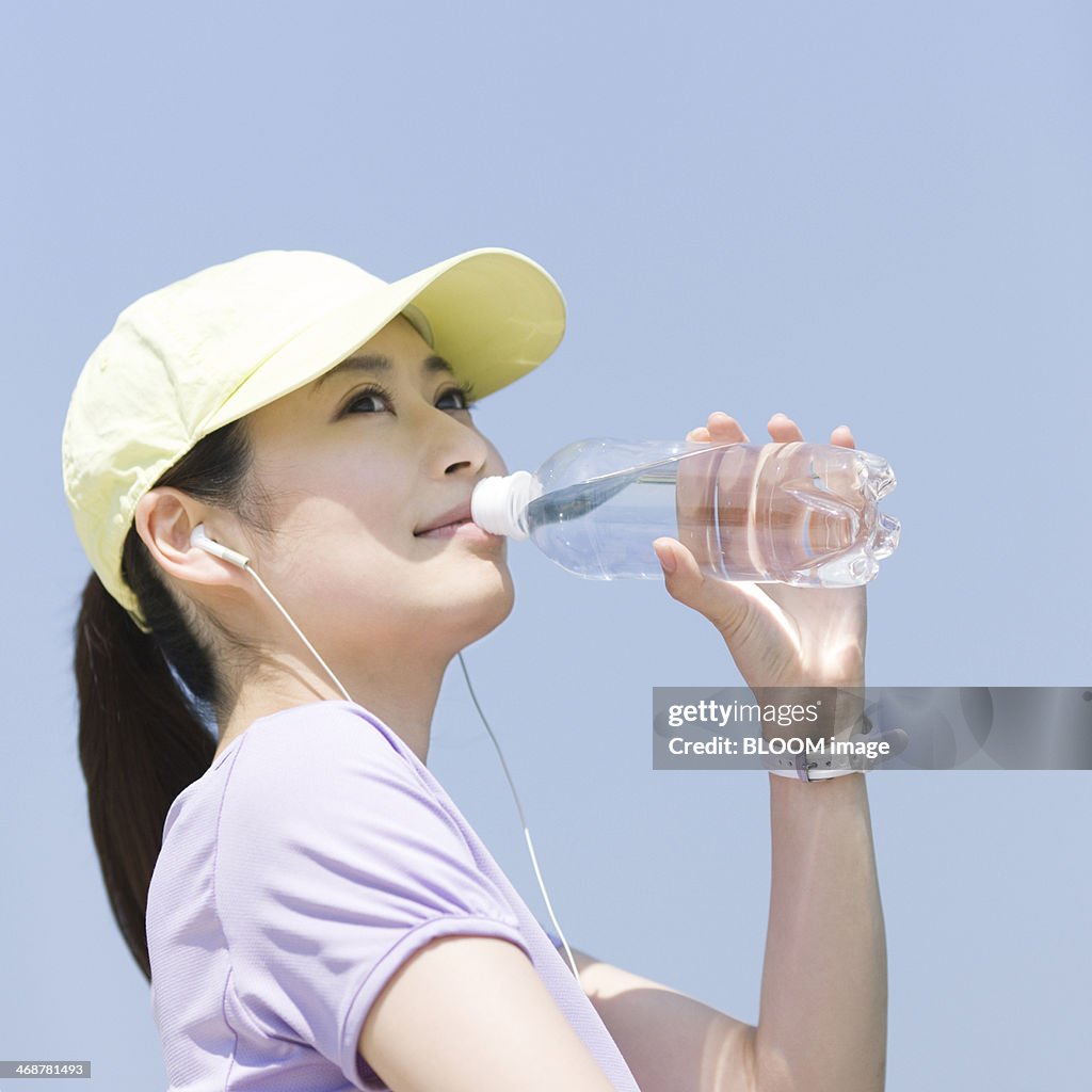 Young Woman Drinking Water