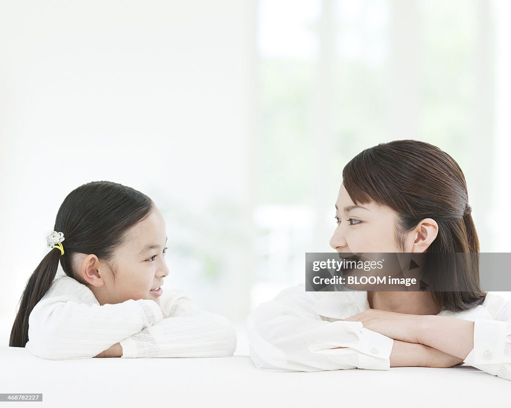 Mother And Daughter Looking At Each Other