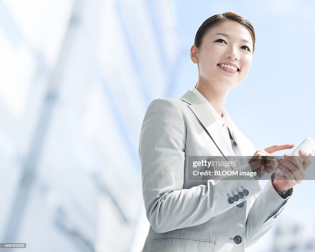 Businesswoman Using Cellphone