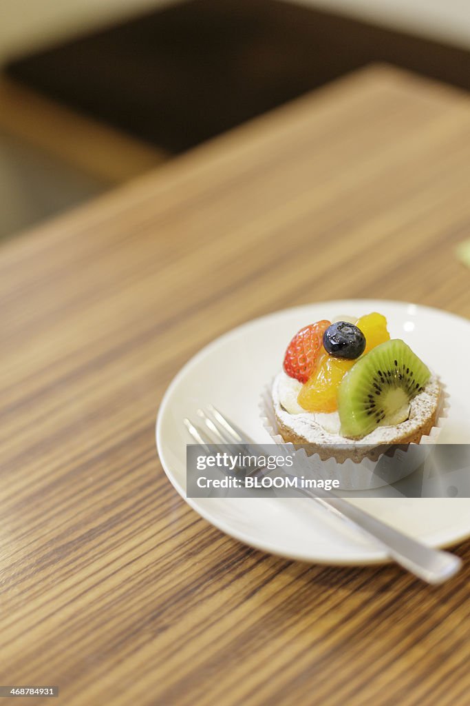Cupcake topped with fresh fruit