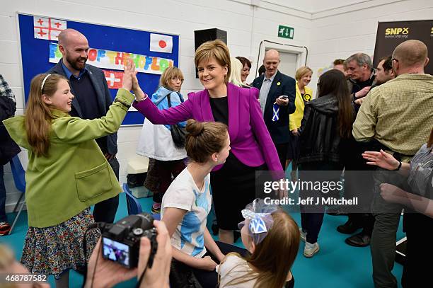 Scotland's First Minister Nicola Sturgeon meets activists following her speech setting out the SNP's plans to reduce child poverty at Forestbank...