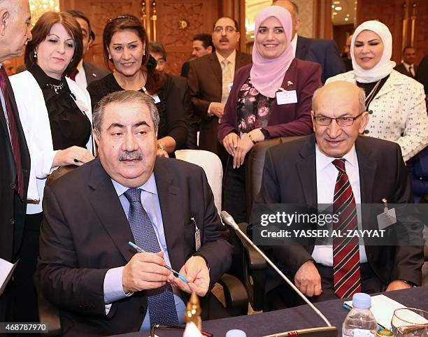 Iraq's Finance Minister Hoshyar Zebari and Iraqi Central Bank's governor Sinan al-Shabibi attend a meeting of Arab Financial Institutions on April 7,...