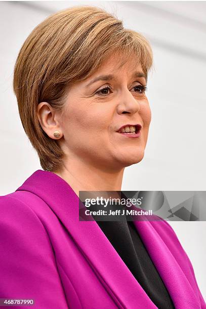 Scotland's First Minister Nicola Sturgeon gives a speech setting out the SNP's plans to reduce child poverty at Forestbank Community Centre on April...