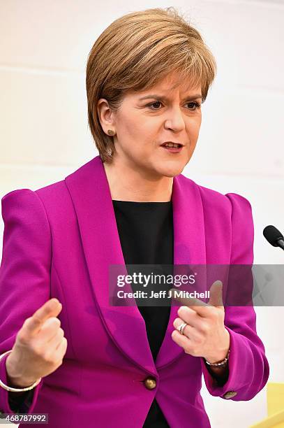 Scotland's First Minister Nicola Sturgeon gives a speech setting out the SNP's plans to reduce child poverty at Forestbank Community Centre on April...