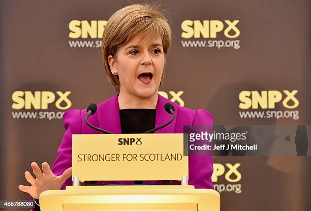 Scotland's First Minister Nicola Sturgeon gives a speech setting out the SNP's plans to reduce child poverty at Forestbank Community Centre on April...