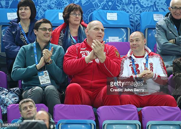 Former Russian swimmer Alexander Popov and former greco-roman wrestler Alexander Karelin and George Bryusov attend the Figure Skating Pairs Short...