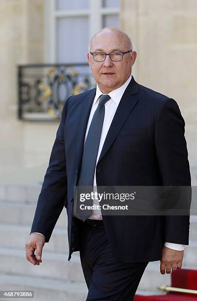 Michel Sapin, French Minister of Finance and the Public Accounts leaves the Elysee Palace after a meeting with French President Francois Hollande and...