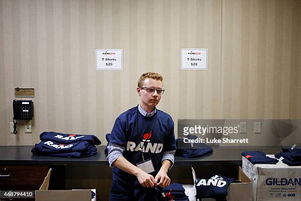 Campaign volunteer Jonathan Polston of Somerset, Ky. Folds Rand Paul T-shirts before an event at which Sen. Rand Paul will announce his candidacy for...