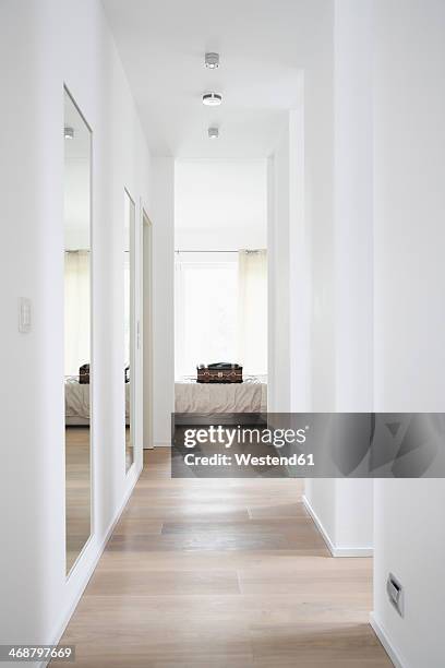 germany, cologne, corridor with bed and suitcase - hallway home stock pictures, royalty-free photos & images