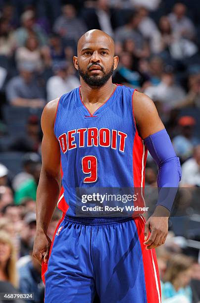 John Lucas III of the Detroit Pistons looks on during the game against the Charlotte Hornets on April 1, 2015 at Time Warner Cable Arena in...