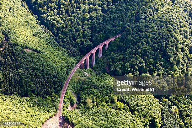 germany, rhineland-palatinate, view of the hubertus viaduct of hunsrueck railway, aerial photo - rail transportation stock-fotos und bilder