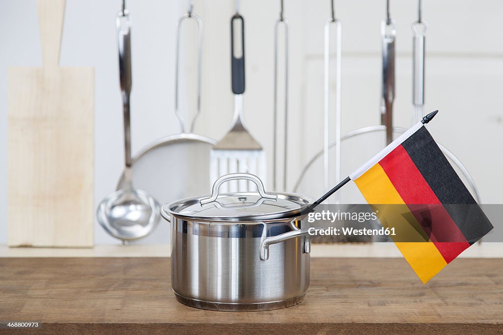 A cooking pot with a german flag in the kitchen