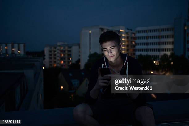 Man Using Cell Phone Light Face 177 Phone Light Flares Stock Photos, High-Res Pictures, and Images ...