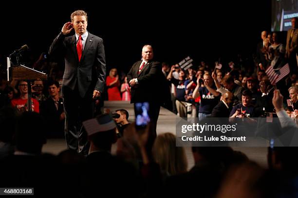 Sen. Rand Paul listens to supporters chant "President Paul" while announcing his candidacy for the Republican presidential nomination during an event...