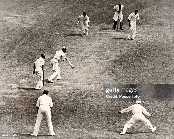 England captain Douglas Jardine steers a ball from All India bowler Amir Singh past second slip during the inaugural 1st Test match between England...