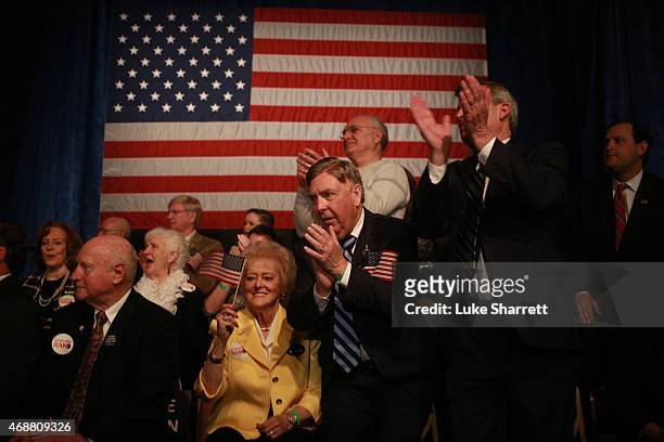 Supporters applaud as Sen. Rand Paul delivers remarks while announcing his candidacy for the Republican presidential nomination during an event at...