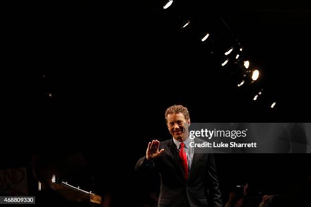 Sen. Rand Paul waves to supporters after announcing his candidacy for the Republican presidential nomination during an event at the Galt House Hotel...