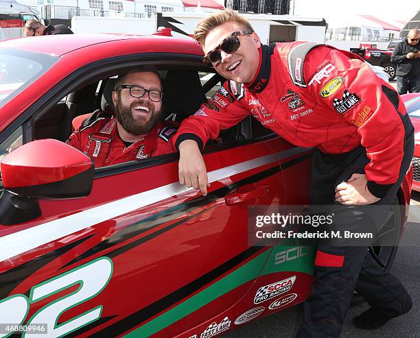 Television host Rutledge Wood and actor Brett Davern speak during the 38th Annual Toyota Pro/Celebrity Race Press Day at the Toyota Grand Prix of...