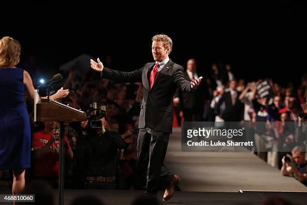 Sen. Rand Paul walks to embrace his wife, Kelley Paul, before announcing his candidacy for the Republican presidential nomination during an event at...