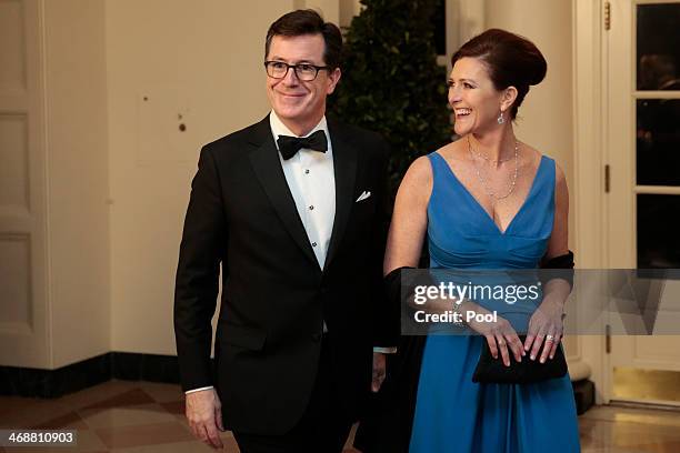 Actor and television host Stephen Colbert, left, and Evie Colbert arrive to a state dinner hosted by U.S. President Barack Obama and U.S. First lady...