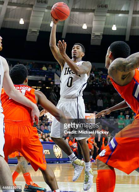 Eric Atkins of the Notre Dame Fighting Irish shoots the ball against the Clemson Tigers at Purcel Pavilion on February 11, 2014 in South Bend,...