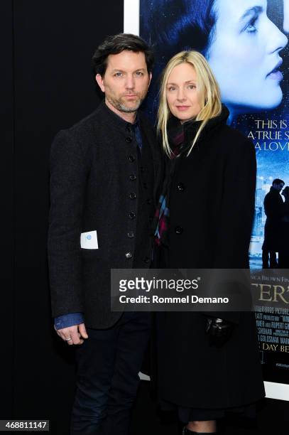 John Patrick Walker and Hope Davis attend the "Winter's Tale" world premiere at Ziegfeld Theater on February 11, 2014 in New York City.
