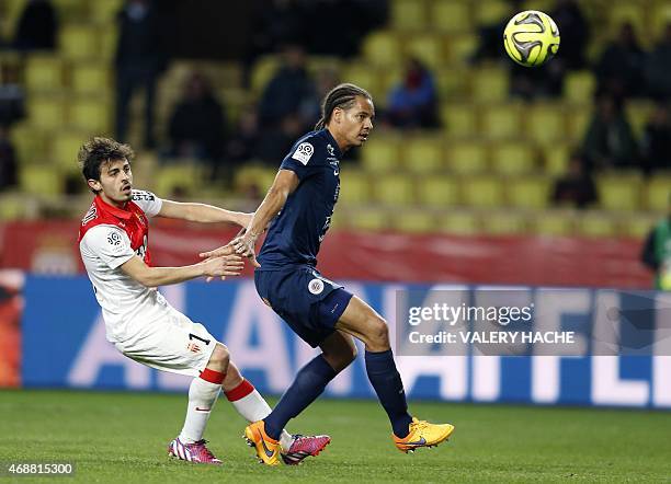 Monaco's Portuguese midfielder Silva Bernardo vies with Montpellier's French defender Daniel Congre during the French L1 football match Monaco vs...