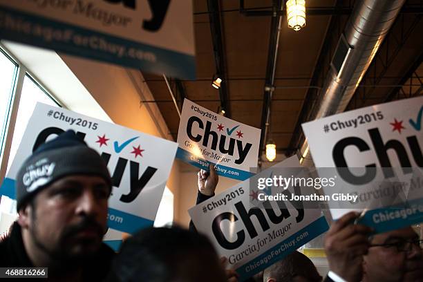 Supporters of Cook County Commissioner and candidate for mayor of Chicago Jesus 'Chuy' Garcia during a news conference at his campaign office April...