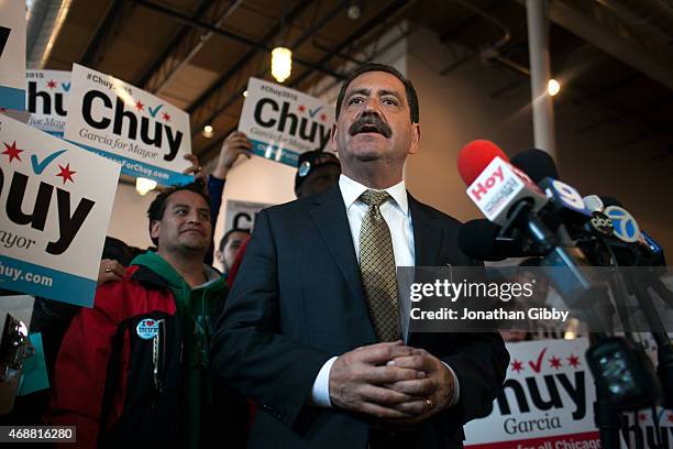 Cook County Commissioner and candidate for mayor of Chicago Jesus 'Chuy' Garcia speaks to reporters during a news conference at his campaign office...