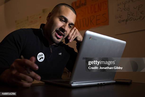 Volunteer Ramon Gomez makes last minute phone calls to ask potential voters to support Cook County Commissioner and candidate for mayor of Chicago...