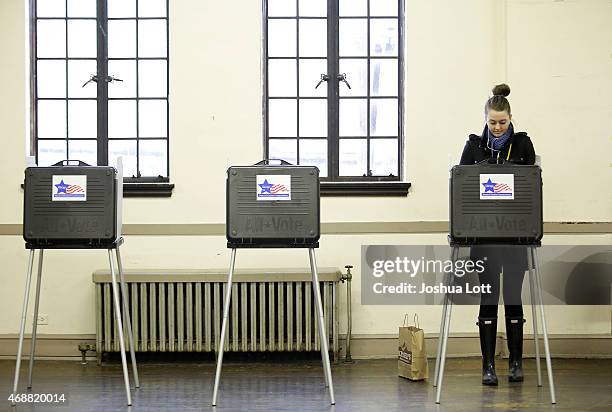 Voter fills out her ballot at a polling station for Chicago's mayor race April 7, 2015 in Chicago, Illinois. Chicago's mayor and candidate for...