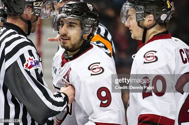 Forward Robby Fabri of the Guelph Storm prepares for a faceoff against the Windsor Spitfires on March 12, 2015 at the WFCU Centre in Windsor,...