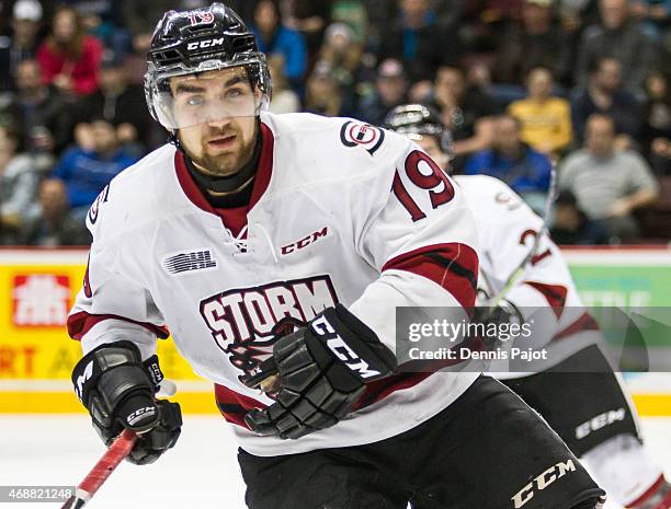 Forward Chris Marchese of the Guelph Storm skates against the Windsor Spitfires on March 12, 2015 at the WFCU Centre in Windsor, Ontario, Canada.