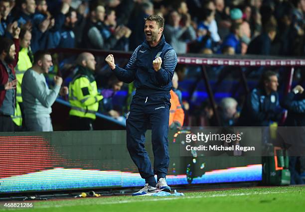 Tim Sherwood manager of Aston Villa celebrates as Christian Benteke of Aston Villa scores their second goal during the Barclays Premier League match...