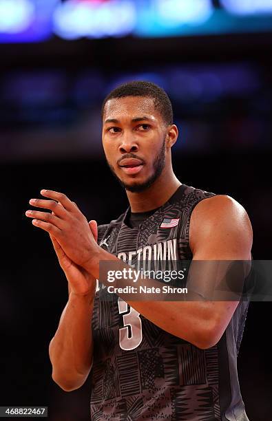 Mikael Hopkins of the Georgetown Hoyas looks on as he claps on the court during the game against the Michigan State Spartans at Madison Square Garden...