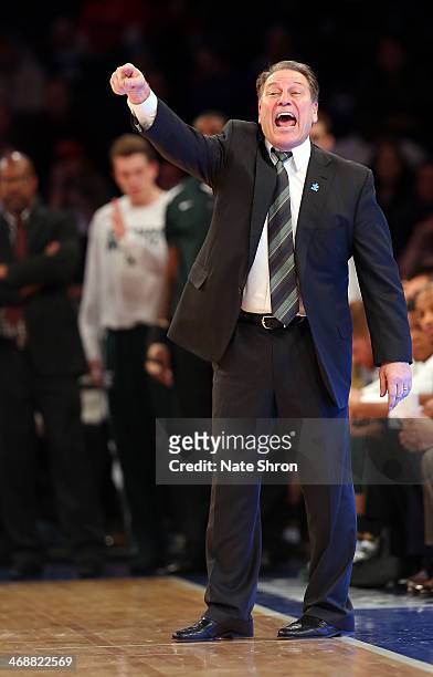 Head coach Tom Izzo of the Michigan State Spartans points as he yells from the sideline during the game against the Georgetown Hoyas during the game...