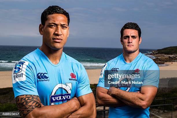 Israel Folau and Dave Dennis of the Waratahs pose for photos during the Australian Super Rugby season launch at Horizons, South Maroubra beach on...