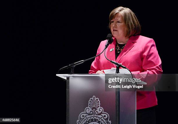 Megan J. Brennan speaks during the Maya Angelou Forever Stamp Dedication at Warner Theatre on April 7, 2015 in Washington, DC.