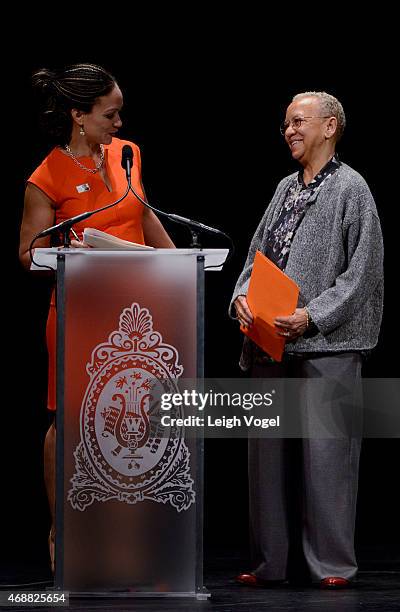 Melissa Harris-Perry and Nikki Giovanni speak during the Maya Angelou Forever Stamp Dedication at Warner Theatre on April 7, 2015 in Washington, DC.