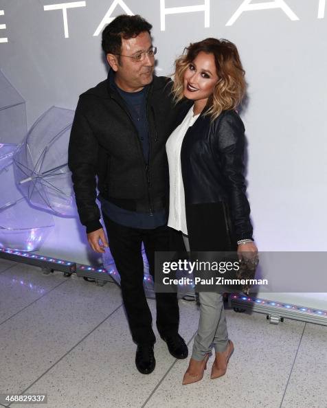 Designer Elie Tahari and actress Adrienne Bailon attend the Elie