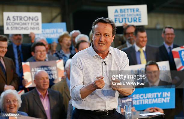 British Prime Minister David Cameron speaks during a Conservative Party rally at The Royal Cornwall Show ground on April 7, 2015 in Wadebridge,...
