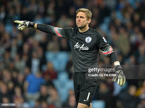 Queens Park Rangers' English goalkeeper Robert Green gestures during the English Premier League football match between Aston Villa and Queens Park...