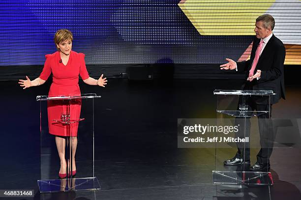 First Minister and SNP leader Nicola Sturgeon speaks as Scottish Liberal Democrat leader Willie Rennie reacts during the Scottish Television Debate...