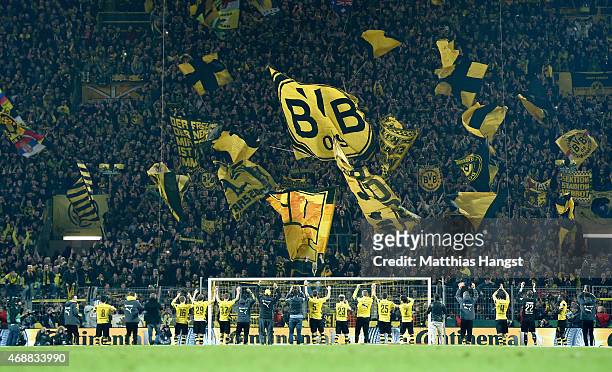 The players of Dortmund celebrate with the fans after the DFB Cup Quarter Final match between Borussia Dortmund and 1899 Hoffenheim at Signal Iduna...