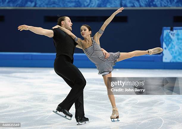 Vera Bazarova and Yuri Larionov of Russia compete during the Figure Skating Pairs Short Program on day 4 of the Sochi 2014 Winter Olympics at Iceberg...