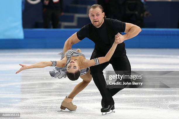 Vera Bazarova and Yuri Larionov of Russia compete during the Figure Skating Pairs Short Program on day 4 of the Sochi 2014 Winter Olympics at Iceberg...