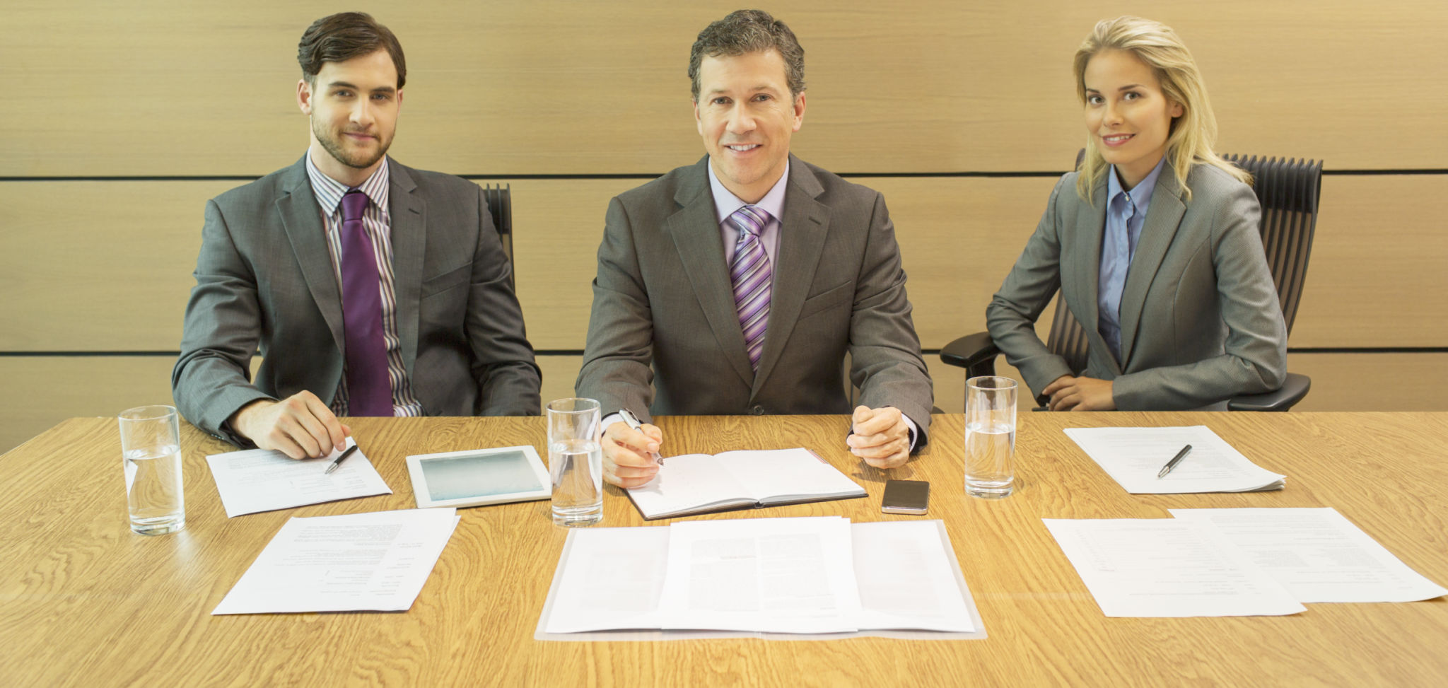 Business people sitting in meeting Business people sitting in meeting