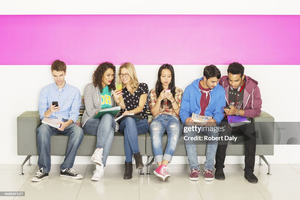 University students sitting on bench