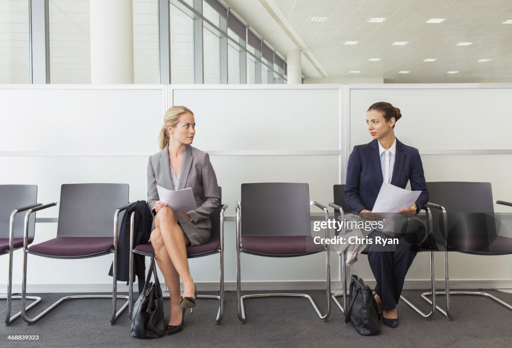 Businesswomen sitting in waiting area