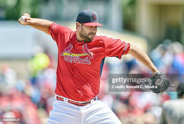 Pitcher Jordan Walden of the St. Louis Cardinals pitches during a spring training game against the New York Mets on March 29, 2015 at Roger Dean...